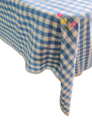 Floral embroidered tablecloth in blue gingham print