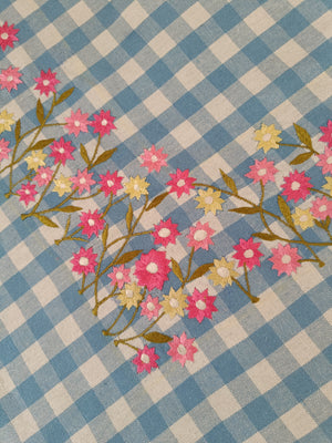 Floral embroidered tablecloth in blue gingham print