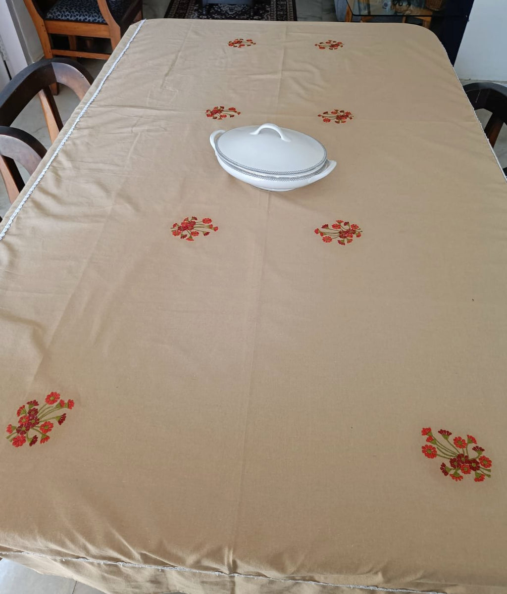 Beige Embroidered 8 seater table cloth with white lace details