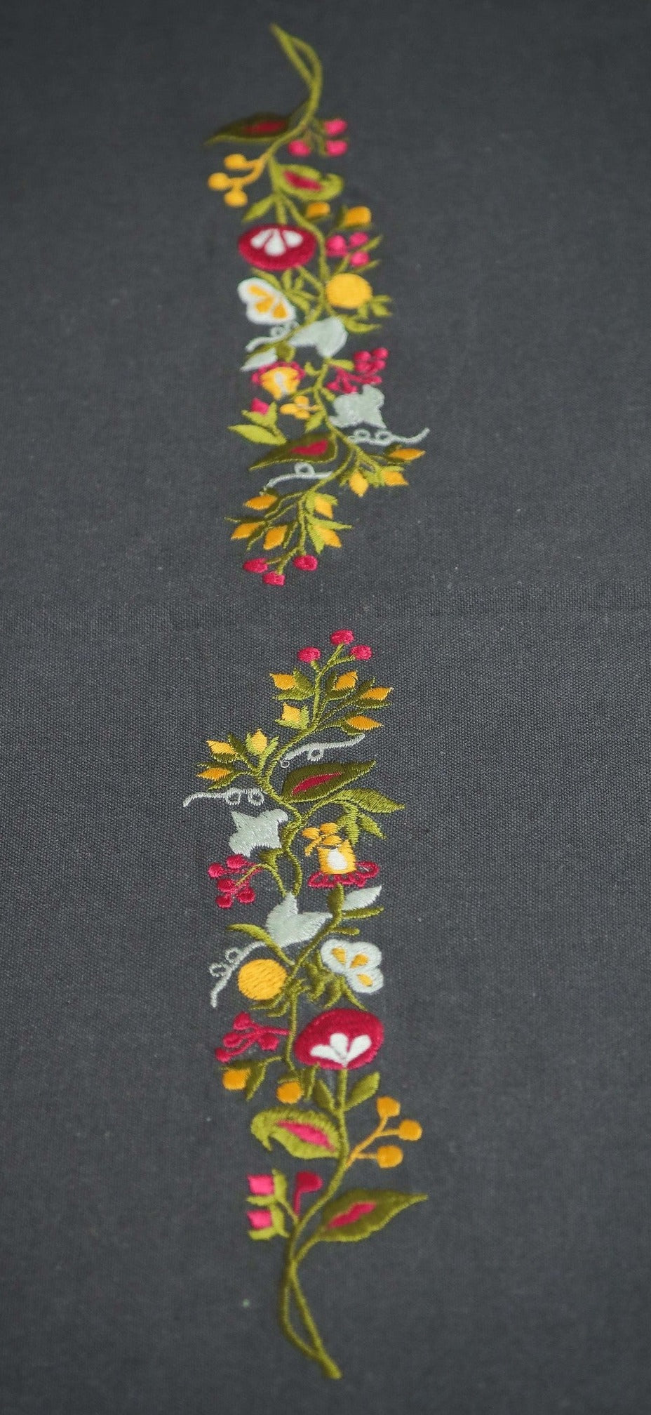 Grey runner with multicoloured floral embroidery